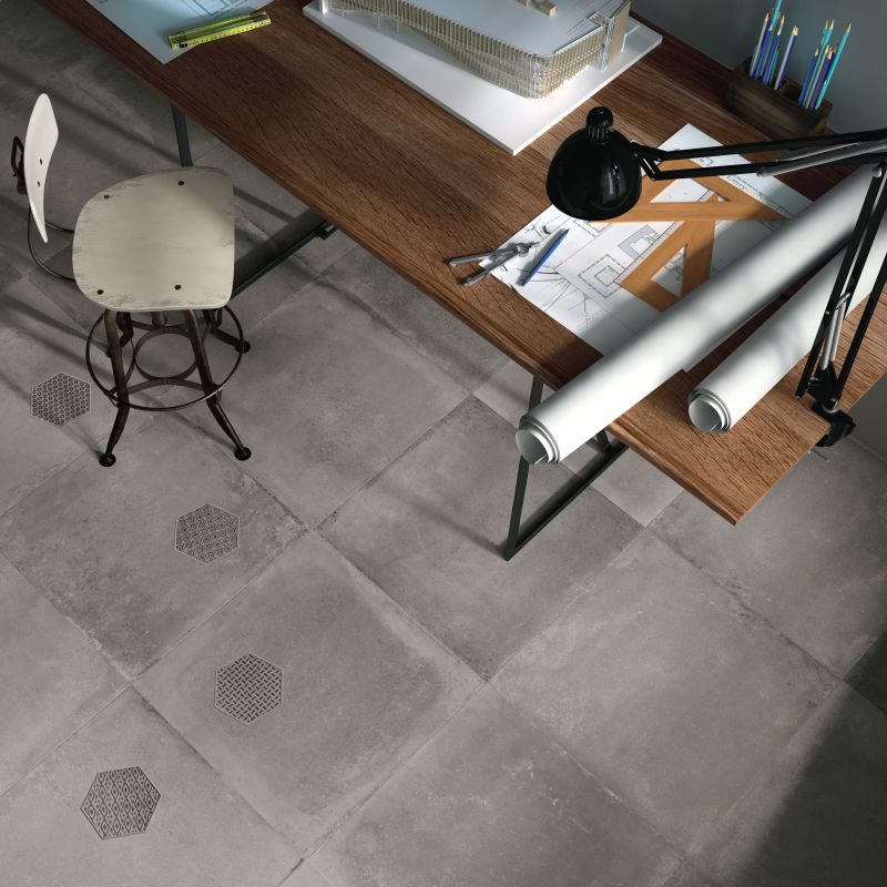 carrelage hexagonal gris pour sol de bureau