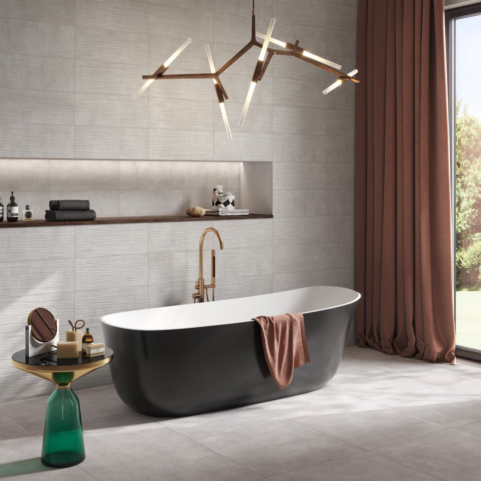 Carrelage salle de bain gris et baignoire ilot