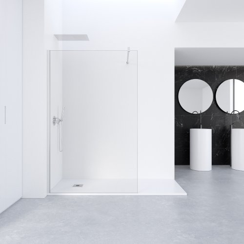 Carrelage blanc, gris et noir pour une salle de bain épurée.