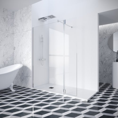 Baignoire et douche dans une salle de bain, carrelage au sol noir et blanc.