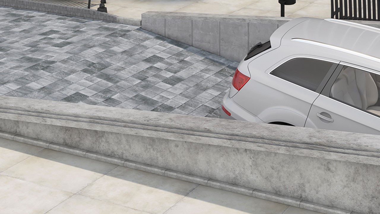 Le carrelage effet pavé pour l'accès au garage.