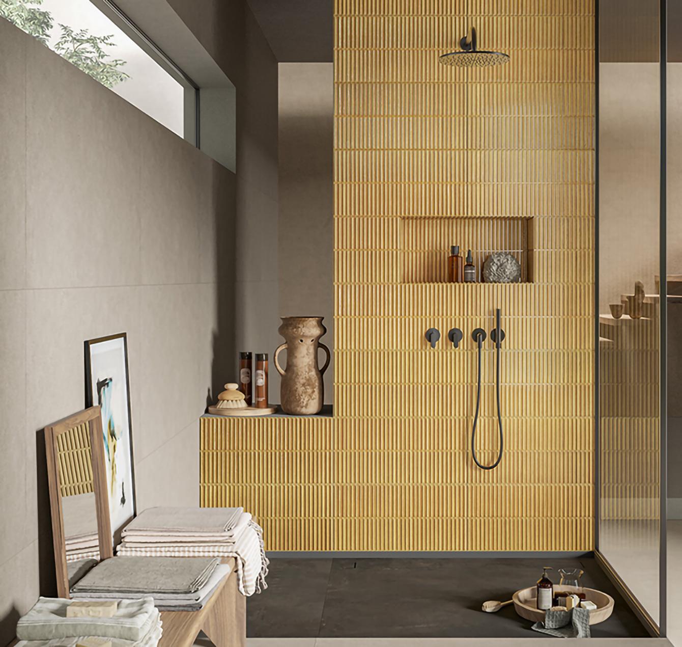 Carreau en relief, tendance en lignes droites Le jaune lumineux de cette faïence en relief apporte la note ensoleillée d'une salle de bain aux inspiration de terre africaine.