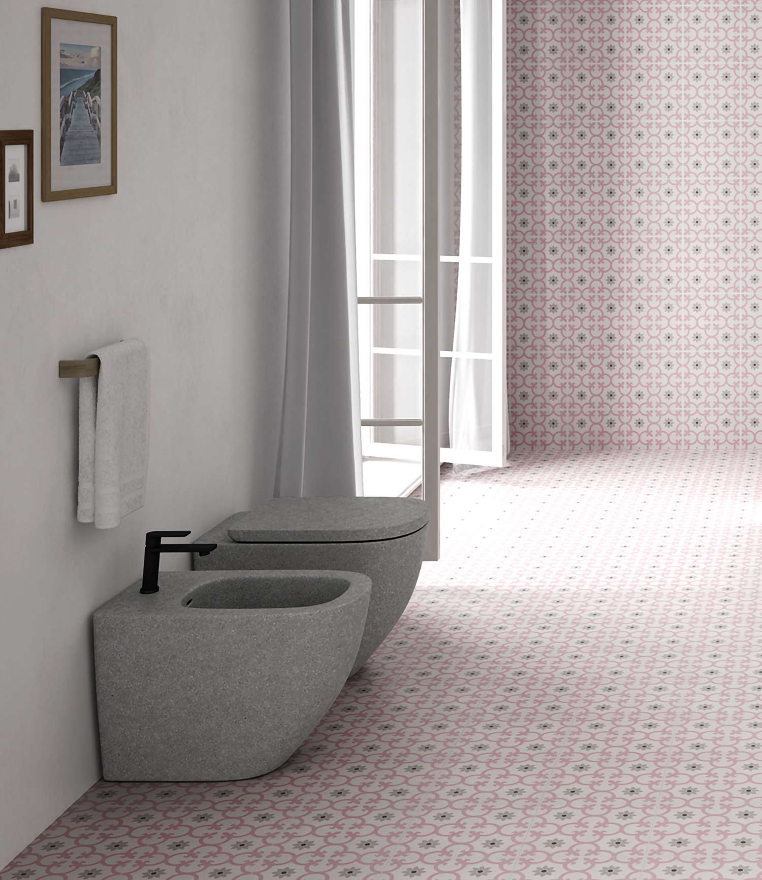 Salle de bain avec toilette et le carrelage sol imitation carreaux de ciment coloris rose